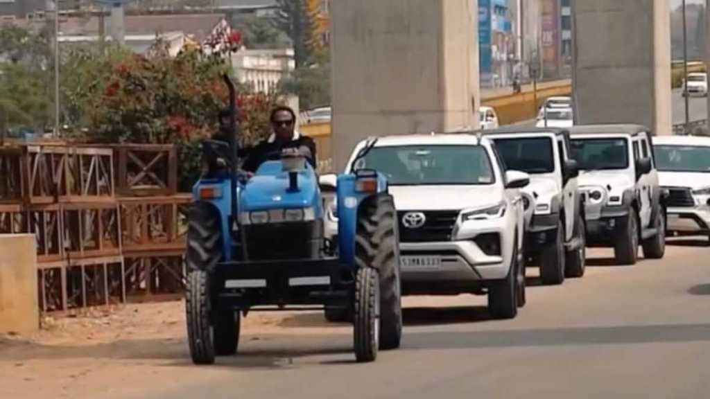 From fields to fortune: Farmer rolls up on a tractor to buy a Land Rover Defender