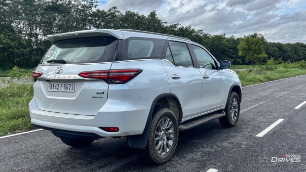 The hybrid system sit between the second and third-row seats.