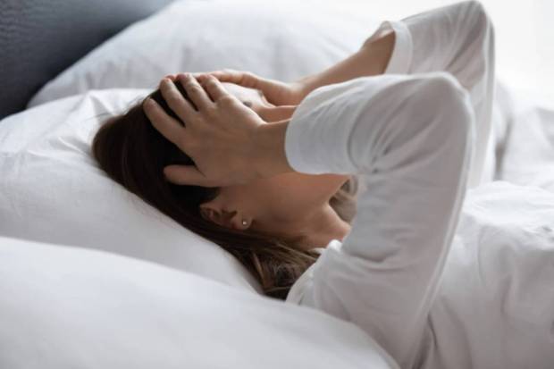 Not getting enough sleep could affect the gut and result in inflammation and headaches. (Photo source: Canva)