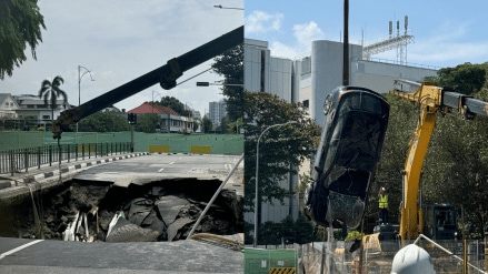 The woman was driving along Tanjong Katong Road South when a section of the road suddenly opened up, causing her and her car to fall into the sinkhole.