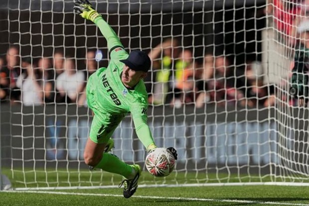Dean Henderson, Crystal Palace's goalkeeper, saves a penalty during the FA Community Shield final soccer match against Liverpool at Wembley Stadium in London. (Image Source: AP)