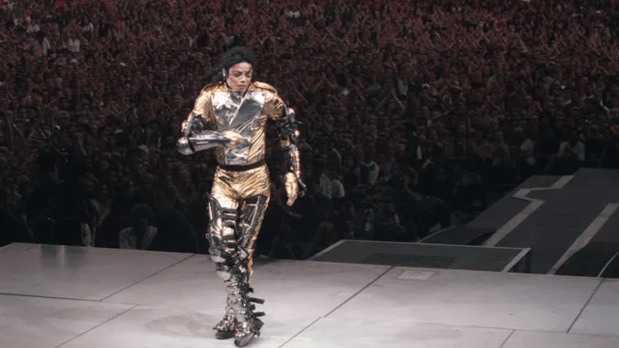  Known for his eccentric performances, Jackson used to go all out during his concerts. (In picture Micheal Jackson rocks a flashy gold ensemble, the hitmaker dazzles the crowd during a concert in 1997 in Germany) (Official Instagram account @Michaeljackson)