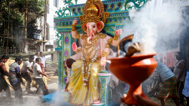 Ganesh Chaturthi 2025 transforms cities and towns across India into vibrant hubs of devotion and festivity. From Mumbai’s pandals and colorful processions in Hyderabad to the artistic workshops of Kolkata and lively community gatherings in small towns, families and devotees welcome Lord Ganesha with immense joy, music, and tradition. These stunning images capture the spirit, togetherness, and colourful spectacle of this beloved festival as it unites millions in celebration and prayer. (Photo Source: PTI)
