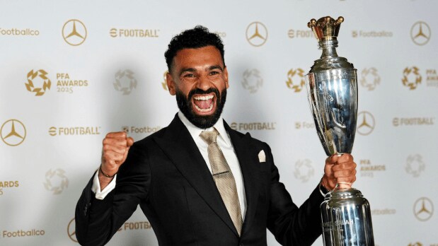 The Egyptian footballer, Mohammad Salah, made history on Tuesday by becoming the first player to ever win three consecutive PFA Men’s Player of the Year awards based on the votes polled by his fellow professionals. The 33-year-old Egypt international scored 29 goals and provided 18 assists in the Premier League as Liverpool powered to a record-equalling 20th English top-flight championship. (Photo Source: Associated Press)