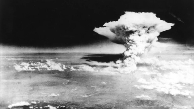 This handout picture, taken on August 6, 1945, by the US Army and released from the Hiroshima Peace Memorial Museum, shows a mushroom cloud of the atomic bomb dropped by the B-29 bomber Enola Gay over the city of Hiroshima. (Photo source: Associated Foreign Press)
