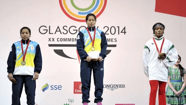 Chanu won her first Commonwealth Games silver in 2014 and soon set a new benchmark by winning gold with a record-setting lift at the 2018 Gold Coast Commonwealth Games, announcing India’s arrival on the world weightlifting map. (Photo Source: PTI)
