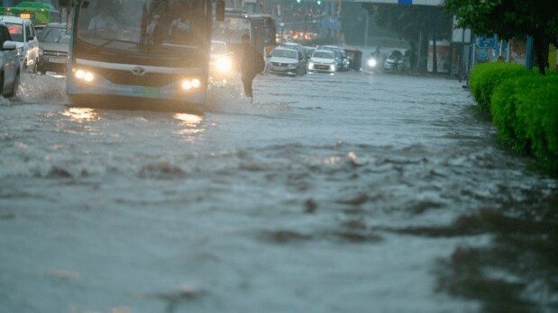 Popular spots such as Minto Bridge and Vijay Chowk experienced heavy waterlogging, with images showing submerged stretches and slow-moving traffic, evoking familiar scenes from past Delhi monsoons. (Photo Source: ANI)