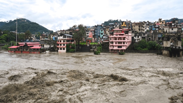 The water level of the Beas River rises exponentially following consistent rains and flows in a spate state in Mandi. (Photo Source: PTI)
