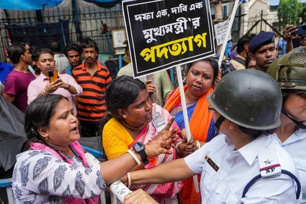 In Kolkata, BJP workers were seen arguing with police during a protest to mark the one-year anniversary of the rape and murder of a trainee doctor at the RG Kar Medical College and Hospital.(Image Source: PTI)