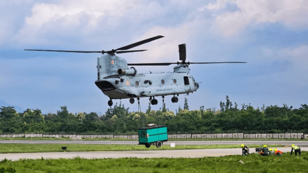  IAF's Chinook helicopter airlifts a generator set for rescue and restoration work in disaster-affected areas of Uttarkashi, in Dehradun, Thursday, Aug. 7, 2025. (Photo Source: PTI)