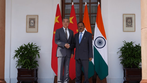 During the meeting, both sides further agreed to resume direct flights and update the Air Space Agreement for easy facilitation of travel visas for promoting tourism and trade. In picture, NSA Doval and Wang Yi shake hands after concluding thier meeting on August 19. (Photo Source: PTI)