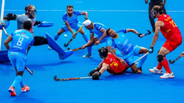 India’s Manpreet Singh vies for the ball with China's Zhang Xiaojia and others during a Men's Hockey Asia Cup 2025 match between India and China to save a goal. Their dive leads to a kerfuffle on the pitch. (Photo Source: PTI)