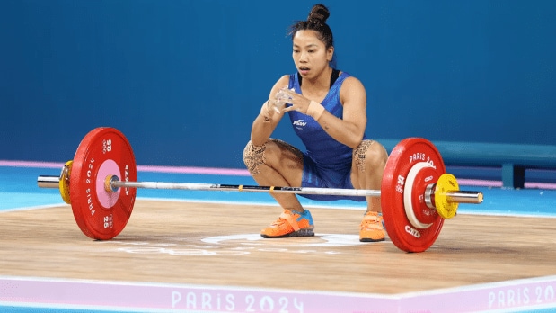 Mirabai Chanu competed in the women's 49kg weightlifting event at the Paris 2024 Olympics, finishing in fourth place and narrowly missing a medal. Following the Paris Olympics, Chanu opted out of the 2024 World Weightlifting Championships to focus on rehabilitation. (Photo Source: PTI)