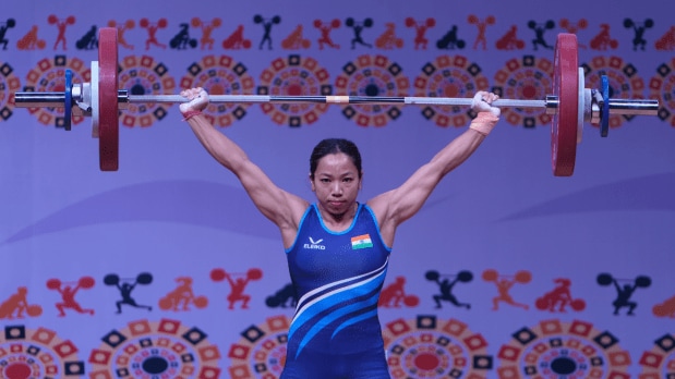 Chanu made a stunning comeback by clinching the gold medal in the women’s 48 kg category at the 2025 Commonwealth Weightlifting Championships in Ahmedabad. She lifted a total of 193 kg, breaking Commonwealth records in snatch (84 kg) and clean & jerk (109 kg). This victory marked her return to international competition after a year-long injury break. (Photo Source: PTI)