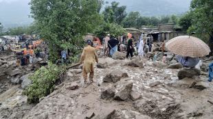 Rescuers and local residents participate in a rescue operation at the site of a massive cloudburst that led to flash flooding in Salarzai (Photo: AP/PTI)