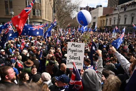 Protestors gather during the March for Australia anti-immigration rally in Melbourne. (AAP Image via AP) Protestors gather during the March for Australia anti-immigration rally in Melbourne. (AAP Image via AP)