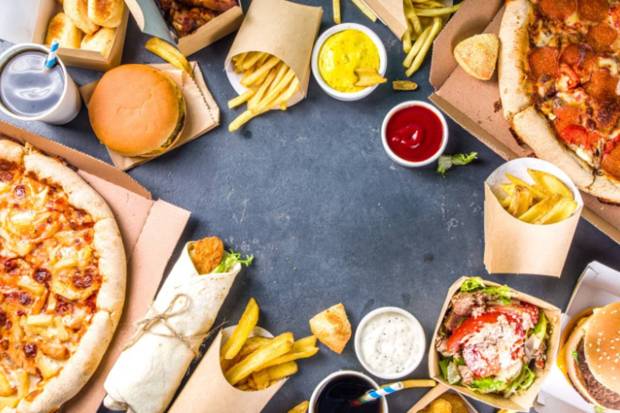 Consumption of fast food on repeat:Takeout meals are usually high in refined carbs and unhealthy fats. Both of these have the capacity to give rise to rapid sugar spikes.(Photo source: Canva)