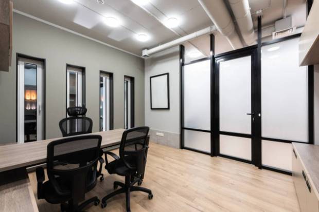  Office gear of good quality: Make sure to invest in office gear like a standing desk, desk treadmill, or ergonomic chairs. (Photo source: Canva)