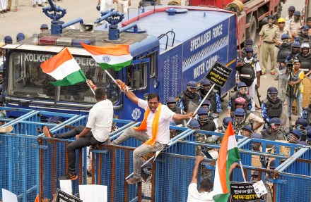 Protestors taking part in a march to the West Bengal secretariat 'Nabanna' to mark the completion of one year of the rape and murder of a trainee doctor at RG Kar hospital, attempt to breach the iron wall barricades set up by the city police, at Santragachi in Howrah district (Photo: PTI) Protestors taking part in a march to the West Bengal secretariat 'Nabanna' to mark the completion of one year of the rape and murder of a trainee doctor at RG Kar hospital, attempt to breach the iron wall barricades set up by the city police, at Santragachi in Howrah district (Photo: PTI)