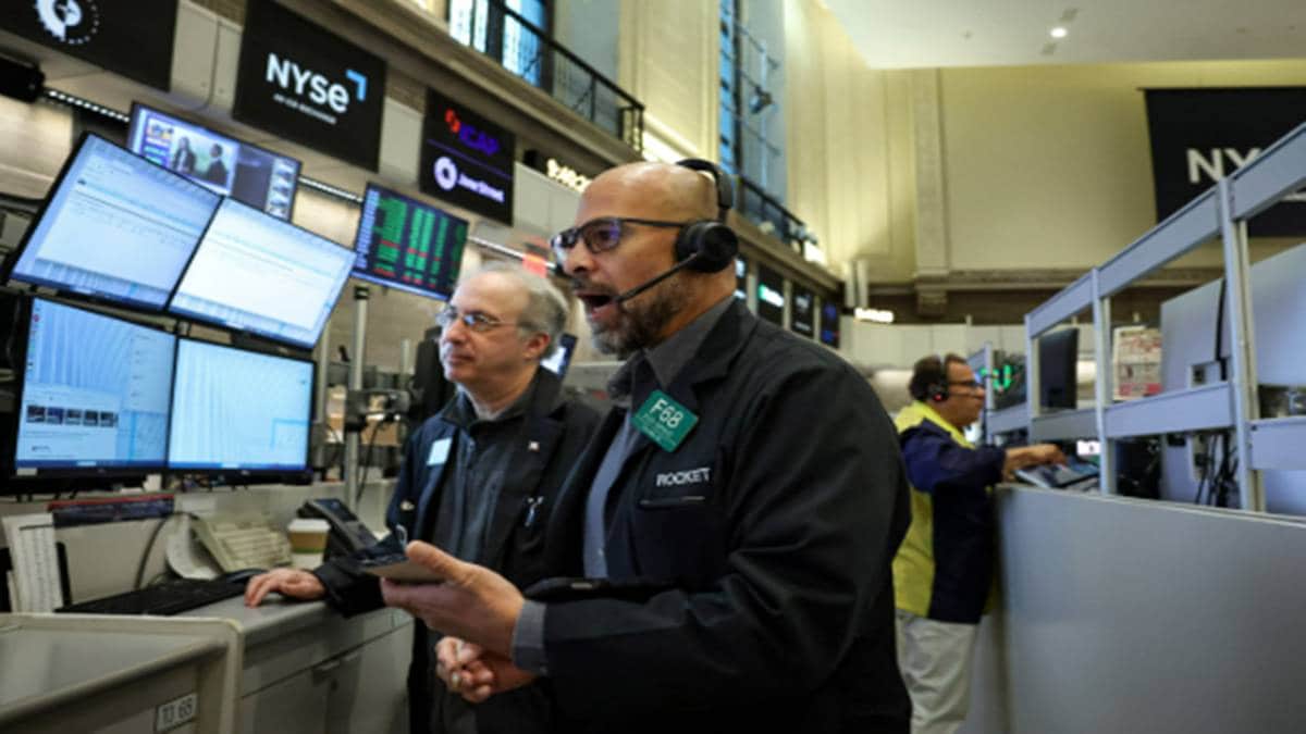 Dow opens over 200 points as investors await Powell’s remarks on the economy