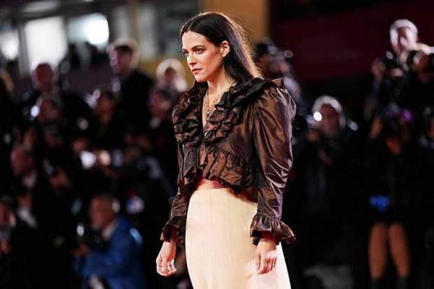 Riley Keough poses for photographers at the red carpet for the film 'Jay Kelly' during the 82nd edition of the Venice Film Festival in Venice, Italy, on Thursday, Aug. 28, 2025 (Photo source: AP)