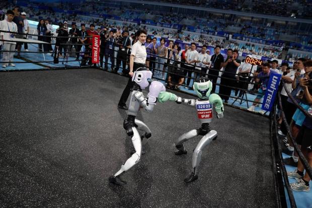 Humanoids were seen playing boxing and exchanging punches. (Photo source: Reuters).