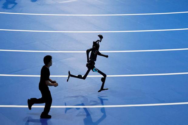 A unitree bot recorded 6:29 in the 1500 m, surpassing human records. (Photo source: Reuters).