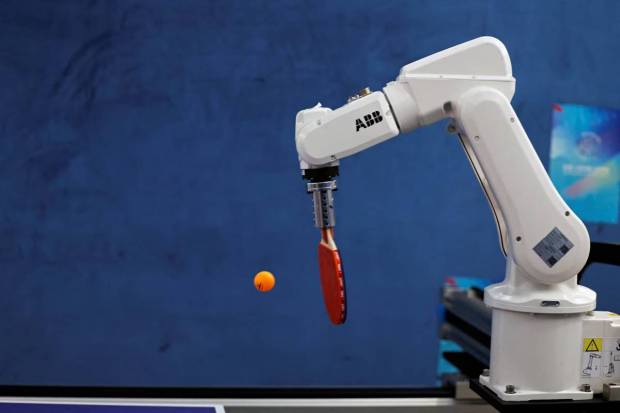An ABB robot arm was seen participating in a table tennis match. (Photo source: Reuters).
