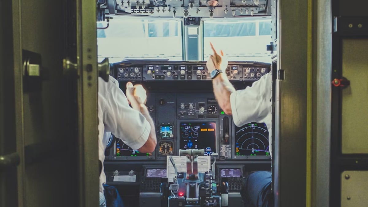 British Airways grounded one of its pilots after he left the cockpit door of a Boeing flight open so that his family could watch him maneuver the plane from London to New York.