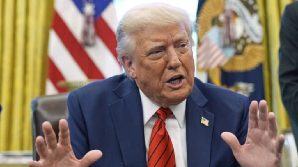 Trump adresses a press conference at the White House ahead of his meeting with Putin.