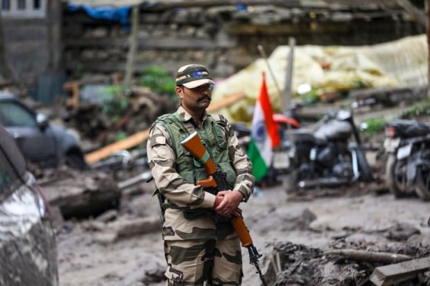 A security personnel keeps vigil at an affected area following a cloudburst in Kishtwar district, Jammu and Kashmir. (Image source: PTI)