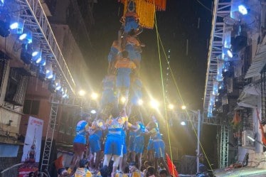 A group of boys performing 'Dahi-Handi' culture in Mumbai on the day of Janmashtami. Dahi Handi is a lively tradition celebrated during Janmashtami that reenacts Lord Krishna's playful childhood act of stealing butter by forming human pyramids to break a pot filled with curd or butter, hung high above the ground. (Image: X)