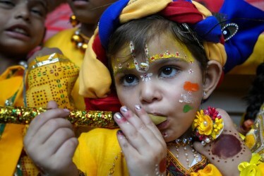 A student dressed as Lord Krishna during celebrations of Janmashtami festival at a school, in Amritsar, Thursday, Aug. 14, 2025. (PTI Photo)