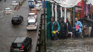 Mumbai rains 2025: IMD issues ‘red alert’ - Waterlogged streets, stranded commuters and railway chaos | in images