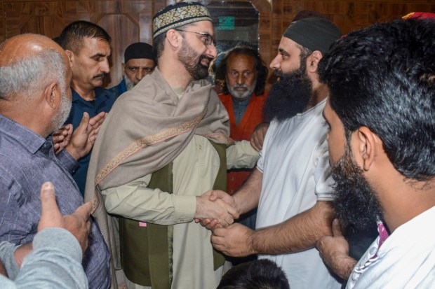 All Parties Hurriyat Conference Chairman Mirwaiz Umar Farooq meets with the family members of Saba Rasool, a Kashmiri student who passed away in Iran. (Image source: PTI)