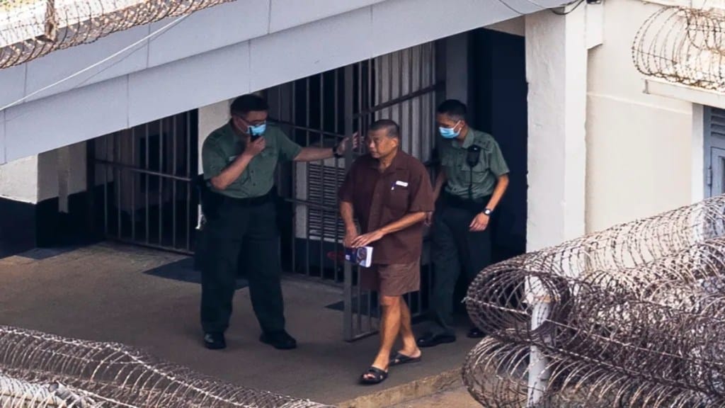 Jimmy Lai walks through the Stanley prison in Hong Kong on July 28, 2023.