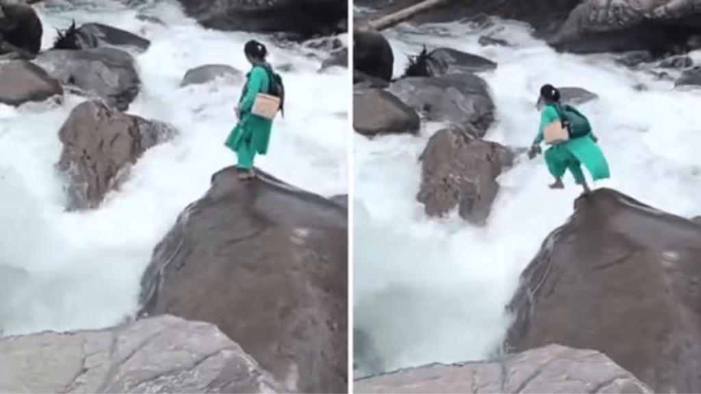 Kamla Devi, a 40-year-old health worker, was seen jumping from one boulder to another as she held her shoes in one hand and her backpack over her shoulders to cross the raging waters in Mandi district. (X/@iNikhilsaini)