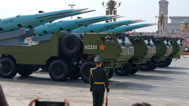 The nuclear triad including land, sea and air-based deterrents featured prominently. Overhead, fighter jets and helicopters flew in formation, while 80,000 doves were released to symbolise peace.  (Photo Source: Associated Press)