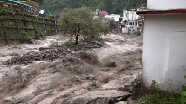  Floods wash away an entire marketplace in Dehradun on Tuesday. No casualties reported in this specific incident. (Photo Source: PTI)