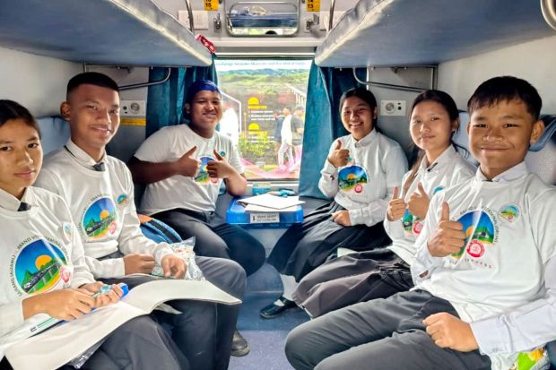 Young students from Aizawl are the first passengers to board the Rajdhani Express from Aizawl to Delhi. (Image: PTI)