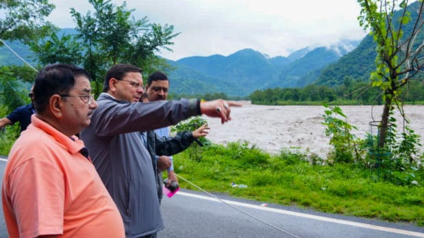 Uttarakhand Chief Minister Pushkar Singh Dhami visited the site a while after the floods took place to take stock of the damage done. The minister was accompanied by officials from the district administration and SDRF personnel. (Photo Source: PTI)