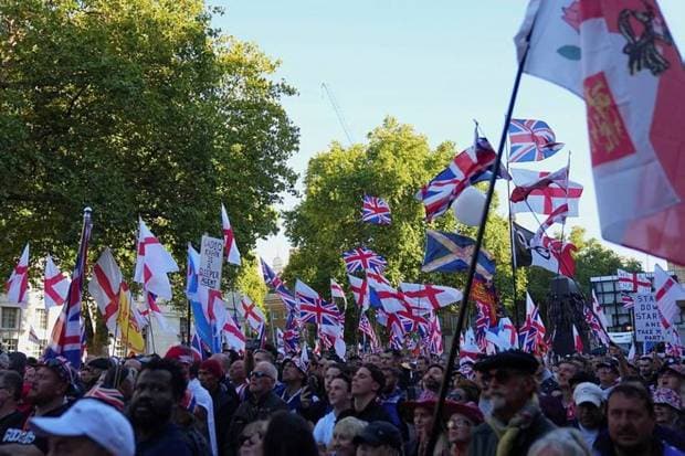 Around 500 people joined the rival March Against Fascism protest. (Photo source: AP)