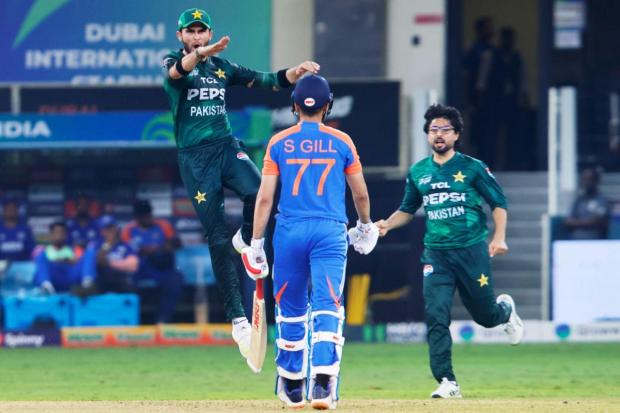 Pakistan’s Faheem Ashraf celebrates with teammates after dismissing India’s Shubman Gill. (IANS)