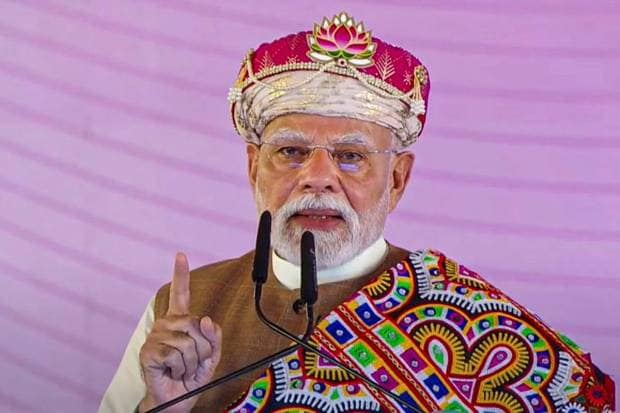 Prime Minister Narendra Modi launched the ‘Swasth Nari Shashakt Parivar Abhiyaan’ and inaugurated several development works in Dhar, Madhya Pradesh. (Photo source: PTI)