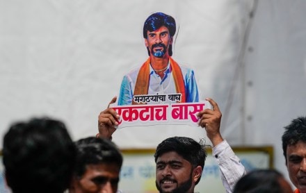 An agitator holds a cutout of activist Manoj Jarange Patil during his indefinite hunger strike demanding reservation for the Maratha community (Photo: PTI)