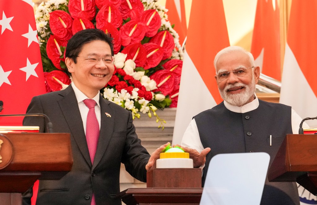 Prime Minister Narendra Modi with Singapore Prime Minister Lawrence Wong during a joint press statement, at the Hyderabad House, in New Delhi, Thursday, Sept. 4, 2025.