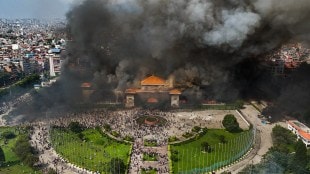 An aerial view of smoke rising from the Federal Parliament of Nepal premises after it was set on fire by protestors during massive anti-government protests (Photo: PTI)
