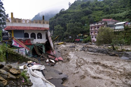 A house near the river lies in ruins after a downpour triggered a cloudburst and landslides, at Sahastradhara, in Dehradun (Photo: PTI)