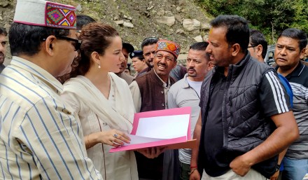 BJP MP Kangana Ranaut interacts with officials during her visit to disaster-affected areas in Manali (Photo: PTI)