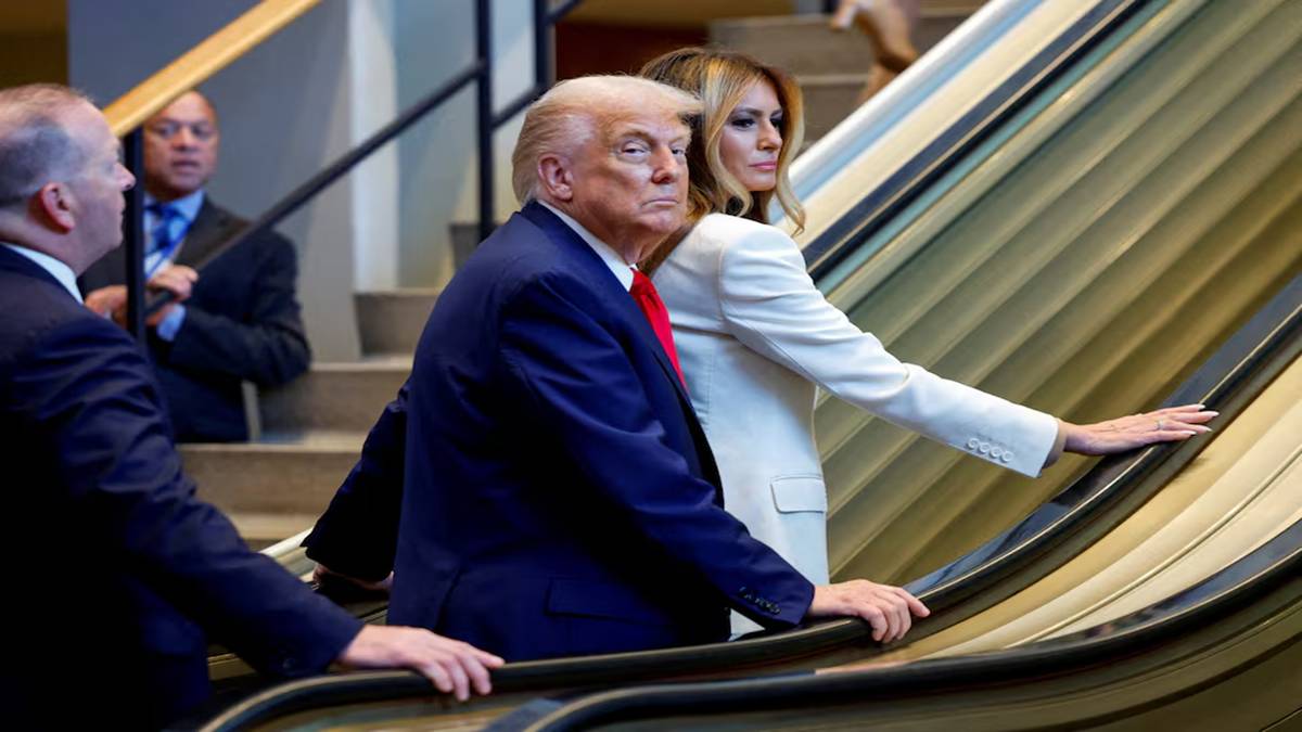Trump on escalator row Trump on escalator row
